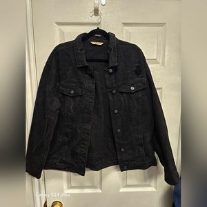 Womans black distressed jacket
